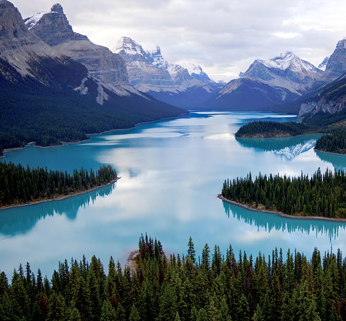 A mountain range above a lake.