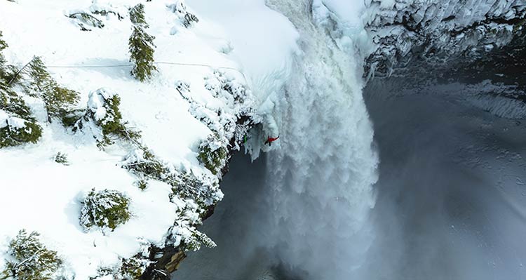 Ice climber ascends Helmcken Falls